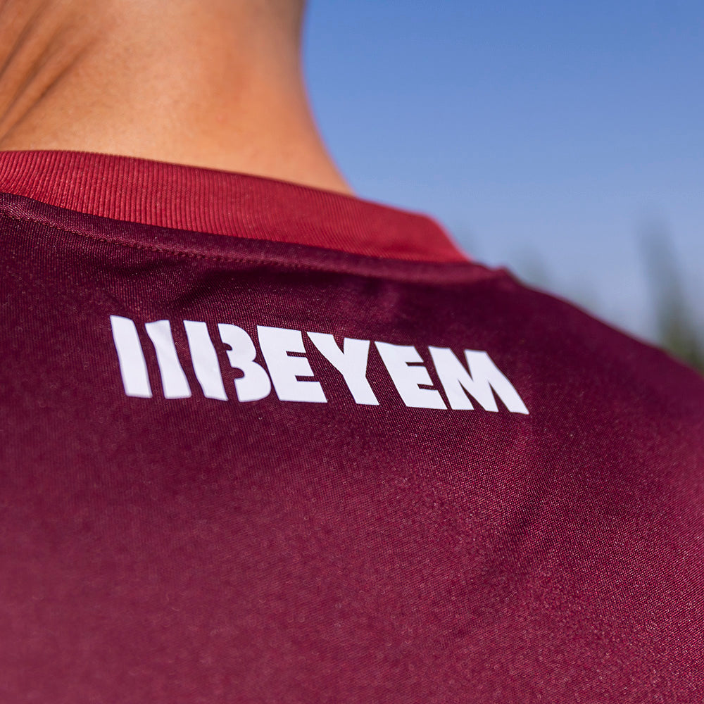 CAMISETA VISITANTE GRANATE JUGADOR JUNIOR 24/25